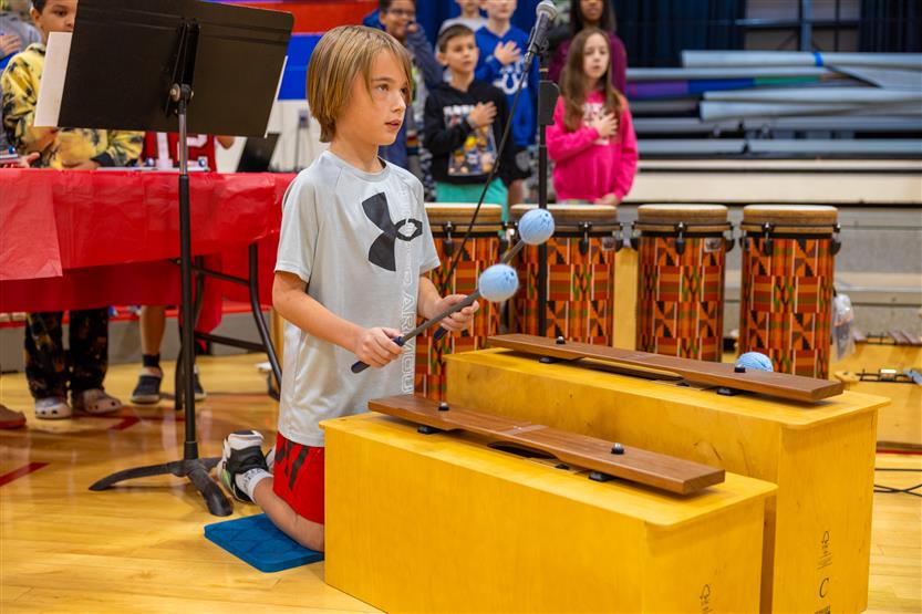 Students play instruments